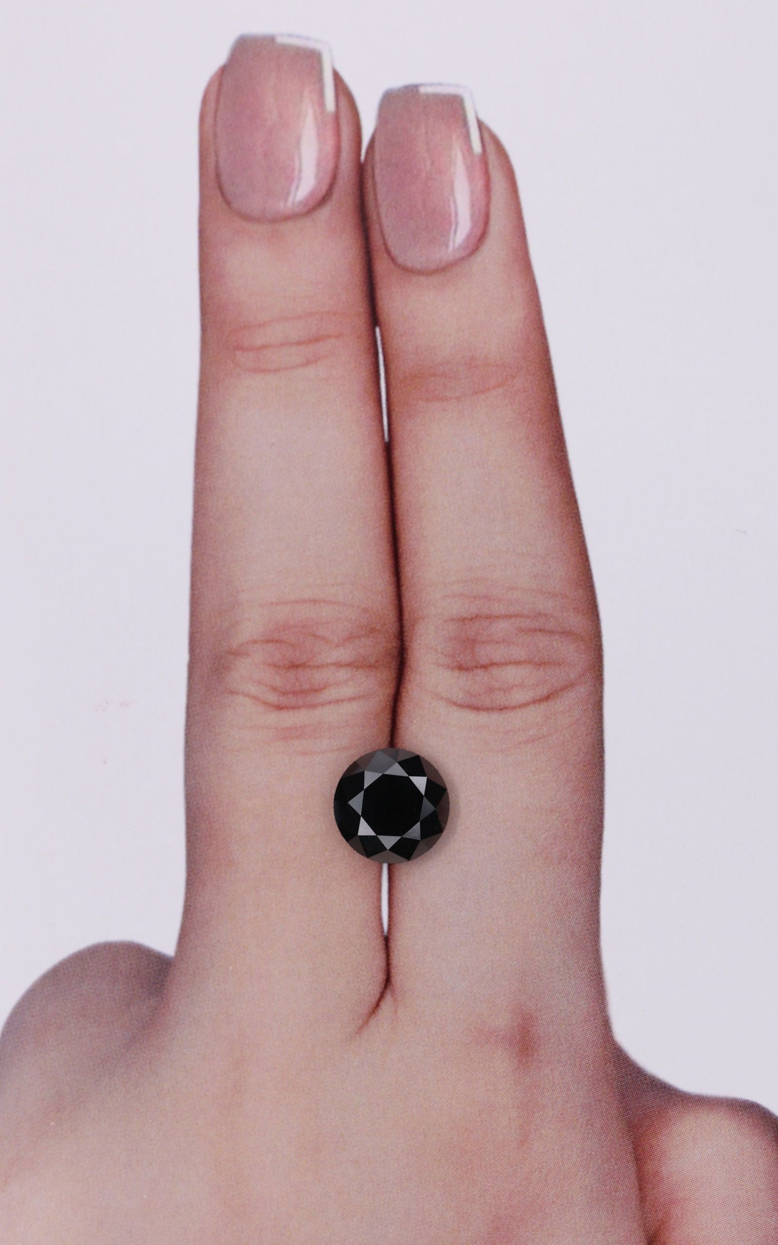 Loose Diamond - ROUND 3.03ct Black: Loose Diamond - ROUND 3.03ct Black Source: Natural Shape: ROUND Carats: 3.03 Color: Black Certification: IGI Video: