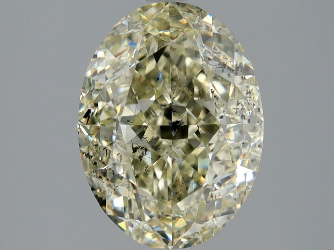 Loose Diamond - OVAL 3.01ct K SI2: Loose Diamond - OVAL 3.01ct K SI2 Source: Natural Shape: OVAL Carats: 3.01 Color: K Clarity: SI2 Certification: IGI Video: