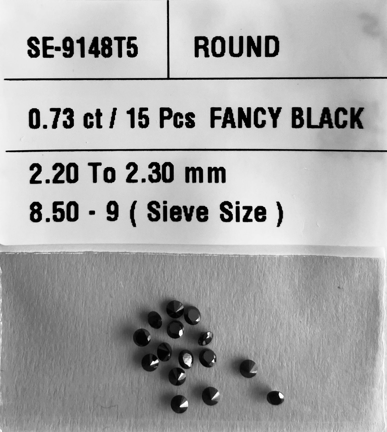 Loose Diamond - ROUND 0.73ct Fancy Black VVS2: Loose Diamond - ROUND 0.73ct Fancy Black VVS2 Source: Natural Shape: ROUND Carats: 0.73 Color: Fancy Black Certification: NONE The Diamond Depot Guarantee: All items in this auction are guaranteed to