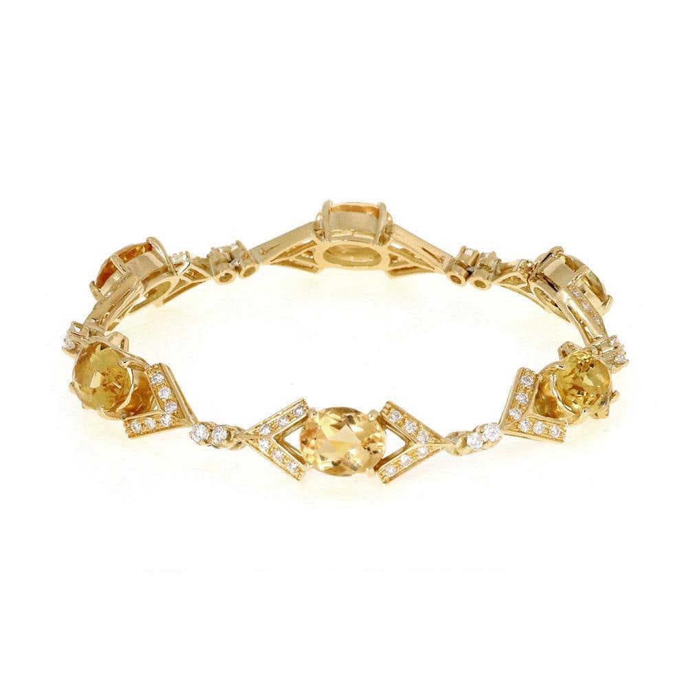 18k Yellow Gold Estate Bracelet with Citrine and Diamond: 18k Yellow Gold Estate Bracelet with Citrine and Diamond This exquisite Estate bracelet features a captivating design of citrine and diamond set in luxurious 18k yellow gold. The centerpiece showcases