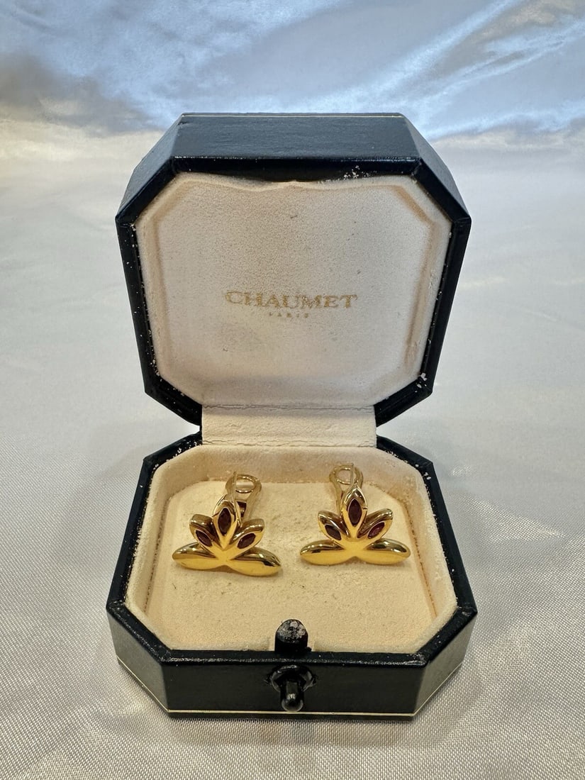 Chaumet 18K Yellow Gold Ruby Cuff Stud Earrings with Box: Chaumet 18K Yellow Gold Ruby Cuff Stud Earrings with Box Discover the elegance of these exquisite earrings from Chaumet, crafted from luxurious 18k yellow gold. Featuring stunning marquise-shaped rubi