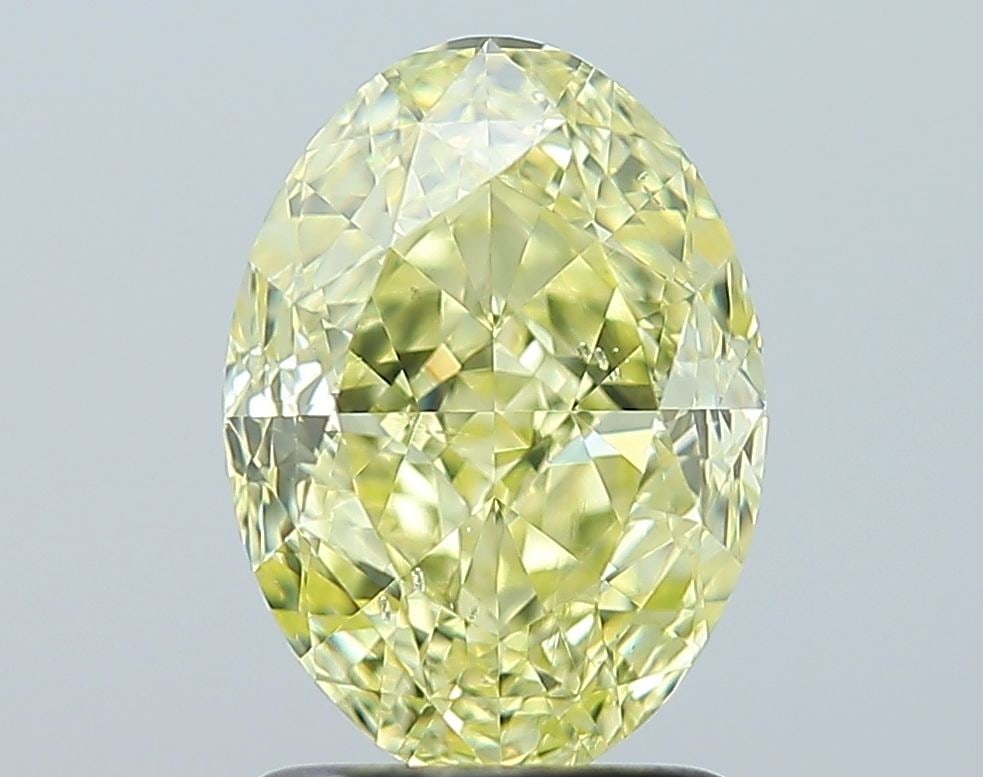 Loose Diamond - OVAL 2.1ct Fancy Yellow SI1: Loose Diamond - OVAL 2.1ct Fancy Yellow SI1 Source: Natural Shape: OVAL Carats: 2.1 Color: Fancy Yellow Certification: GIA Video: