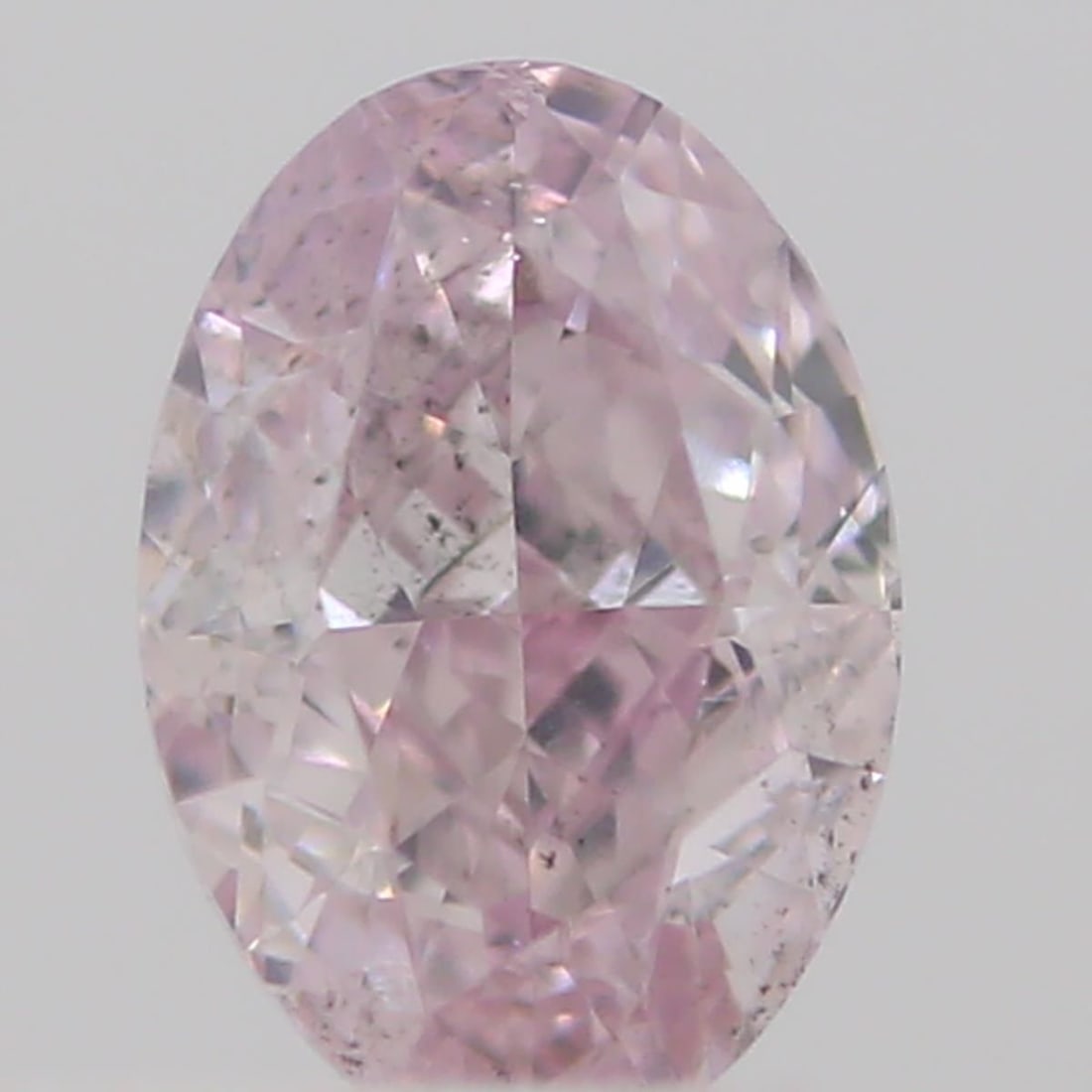 Loose Diamond - OVAL 0.2ct Fancy Light Pink SI2: Loose Diamond - OVAL 0.2ct Fancy Light Pink SI2 Source: Natural Shape: OVAL Carats: 0.2 Color: Fancy Light Pink Certification: GIA Video: