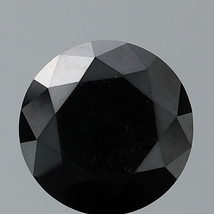 Loose Diamond - ROUND 0.64ct Fancy Black VVS2: Loose Diamond - ROUND 0.64ct Fancy Black VVS2 Source: Natural Shape: ROUND Carats: 0.64 Color: Fancy Black Certification: NONE Video: