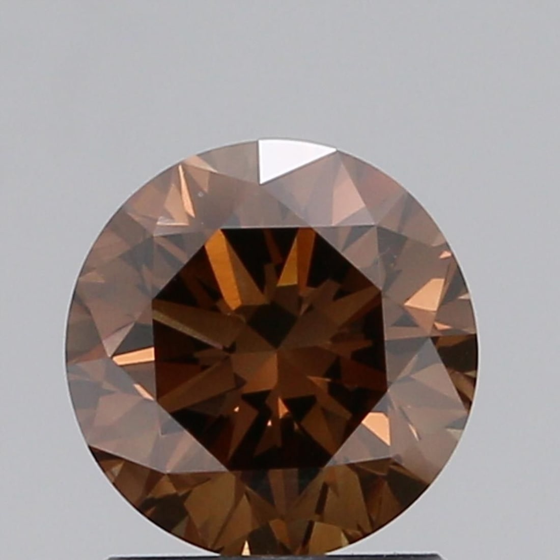 Loose Diamond - ROUND 1.32ct Fancy Dark Orangey Brown VVS2: Loose Diamond - ROUND 1.32ct Fancy Dark Orangey Brown VVS2 Source: Natural Shape: ROUND Carats: 1.32 Color: Fancy Dark Orangey Brown Certification: GIA Video: