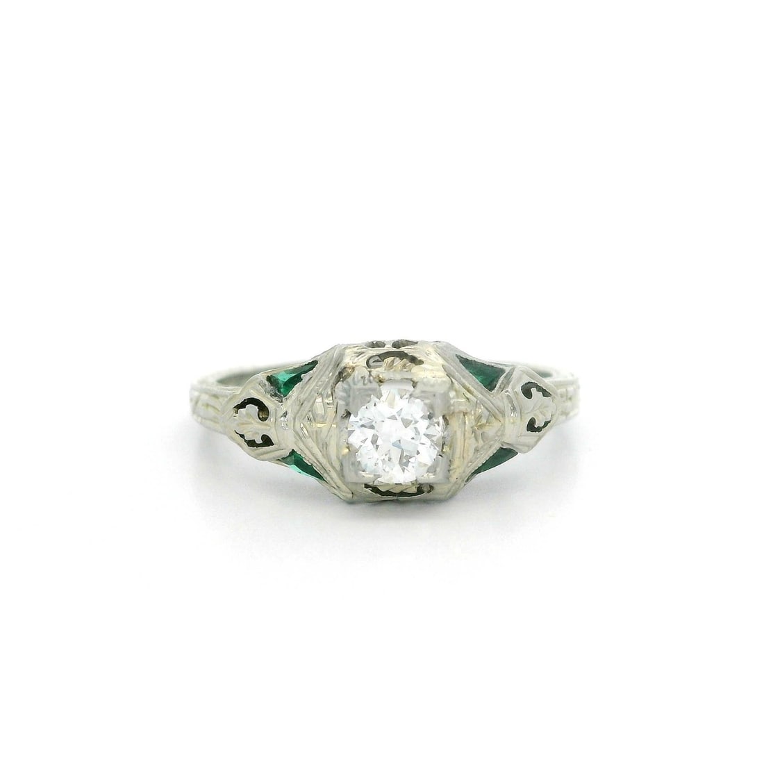 Antique Art Deco 18k White Gold Diamond Green Stone Filigree Ring: Antique Art Deco 18k White Gold Diamond Green Stone Filigree Ring This exquisite antique Art Deco ring features a stunning 18k white gold setting adorned with a central natural genuine diamond and fou