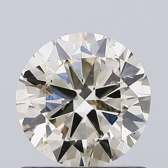 Loose Diamond - ROUND 0.89ct Fancy Light Brown SI1: Loose Diamond - ROUND 0.89ct Fancy Light Brown SI1 Source: Natural Shape: ROUND Carats: 0.89 Color: Fancy Light Brown Certification: NONE Video: