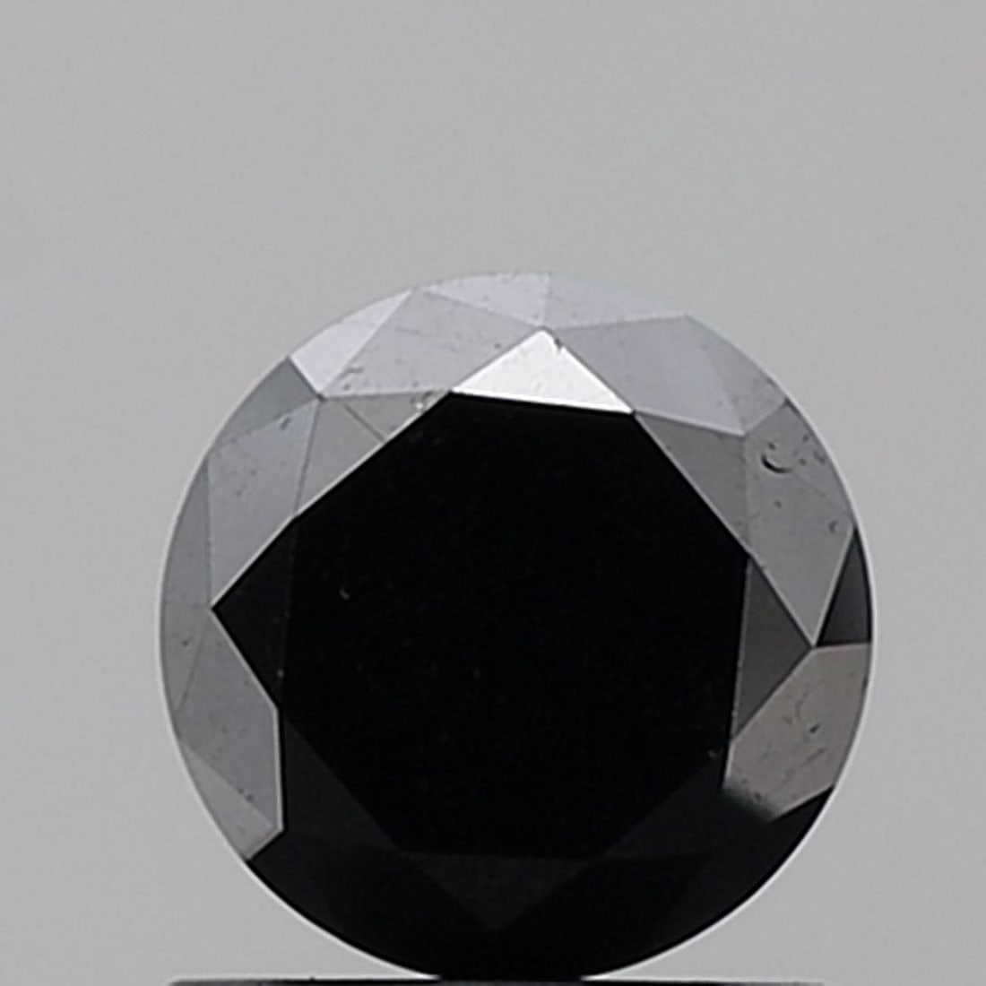 Loose Diamond - ROUND 1.23ct Black VVS2: Loose Diamond - ROUND 1.23ct Black VVS2 Source: Natural Shape: ROUND Carats: 1.23 Color: Black Certification: NONE Video:
