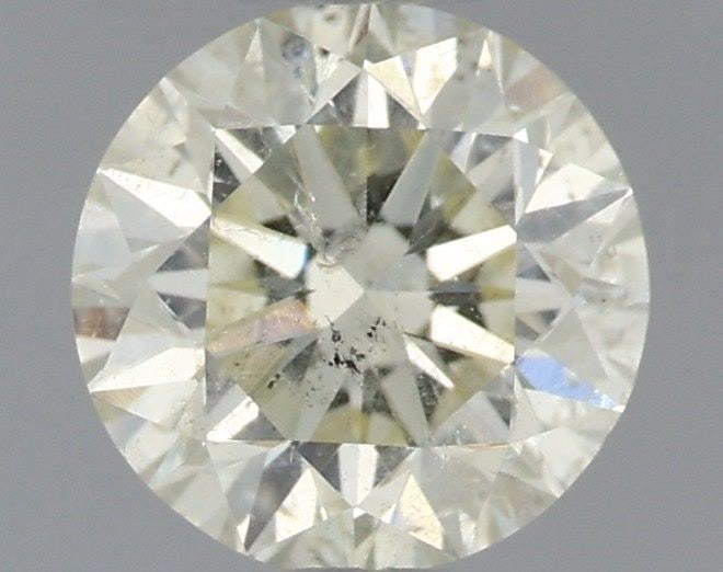 Loose Diamond - ROUND 0.6ct O-P I1: Loose Diamond - ROUND 0.6ct O-P I1 Source: Natural Shape: ROUND Carats: 0.6 Color: O-P Certification: IGI Video: