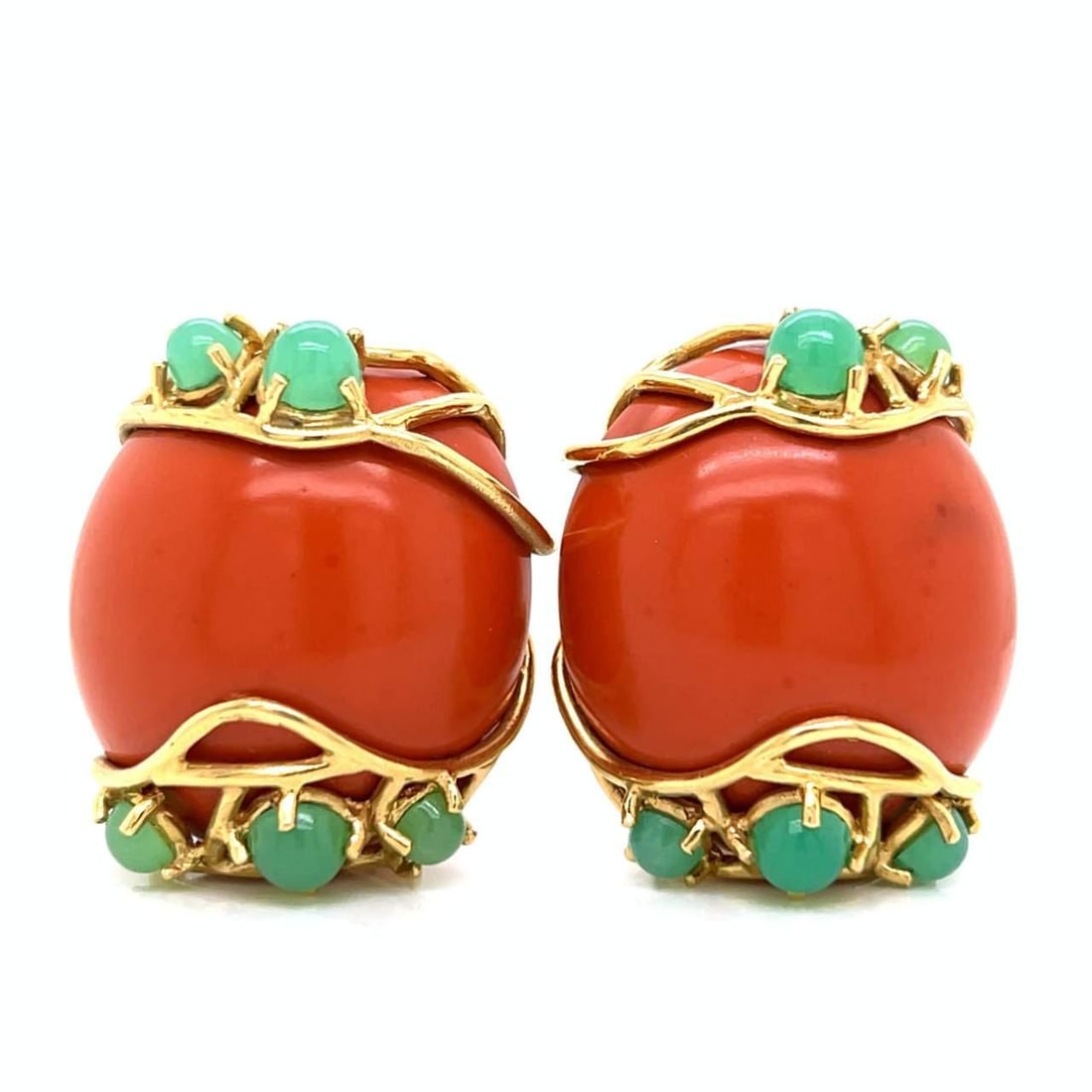 1960s 18K Yellow Gold Coral Chrysoprase Earrings Vintage: 1960s 18K Yellow Gold Coral Chrysoprase Earrings Vintage This exquisite pair of 1960's earrings features an elegant design crafted from 18K yellow gold. The earrings showcase vibrant coral stones, eac