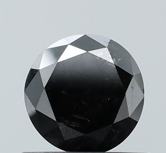 Loose Diamond - ROUND 0.58ct Fancy Black VS1: Loose Diamond - ROUND 0.58ct Fancy Black VS1 Source: Natural Shape: ROUND Carats: 0.58 Color: Fancy Black Certification: NONE Video: