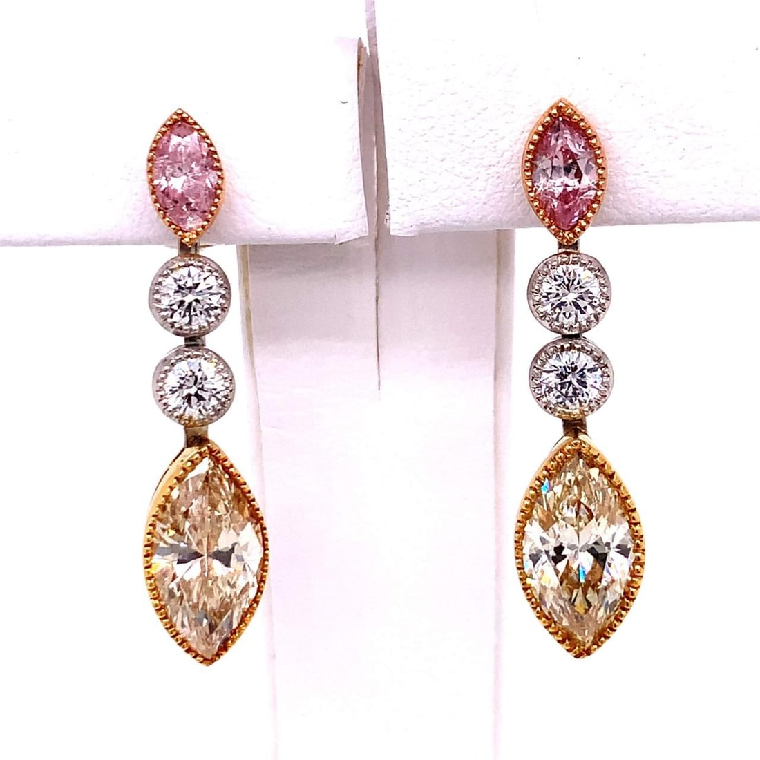 18K Yellow Gold Diamond Earrings with Fancy Colored Diamonds: 18K Yellow Gold Diamond Earrings with Fancy Colored Diamonds These exquisite earrings are crafted from 18K yellow gold and feature a stunning array of colored diamonds. They weigh 8.8 grams and are ad