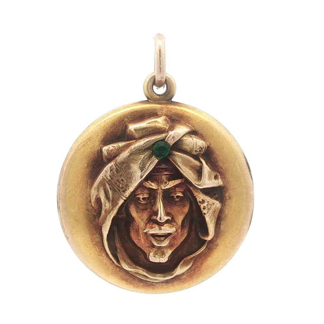 Art Nouveau Solid Gold Genie Sultan Engraved Locket Pendant: Art Nouveau Solid Gold Genie Sultan Engraved Locket Pendant This exquisite Art Nouveau locket pendant showcases a captivating design crafted from solid 9-10k yellow gold with a gold wash. The piece fe