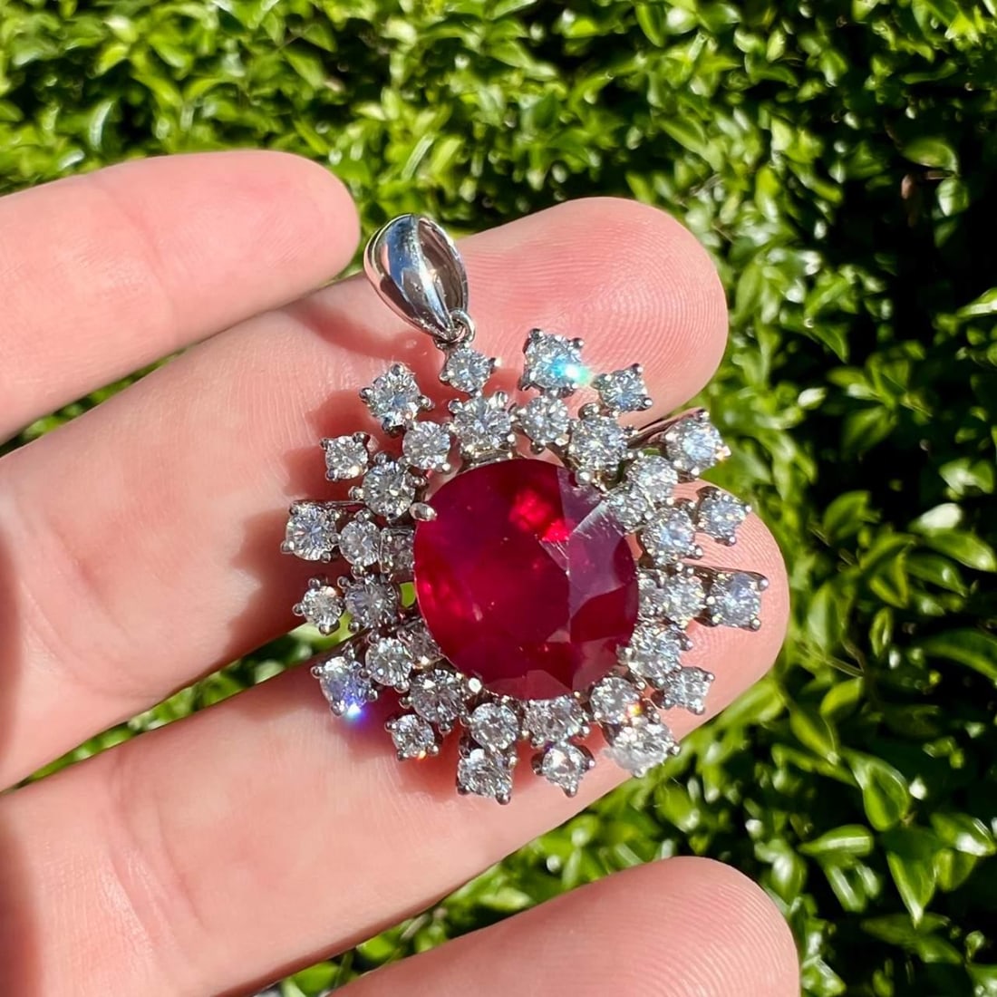 18K White Gold Ruby Diamond Pendant 8.00 Ct Glass-Filled 36 Diamonds: 18K White Gold Ruby Diamond Pendant 8.00 Ct Glass-Filled 36 Diamonds This exquisite 18K White Gold Pendant features a stunning glass-filled ruby weighing approximately 8.00 Ct, complemented by 36 spar