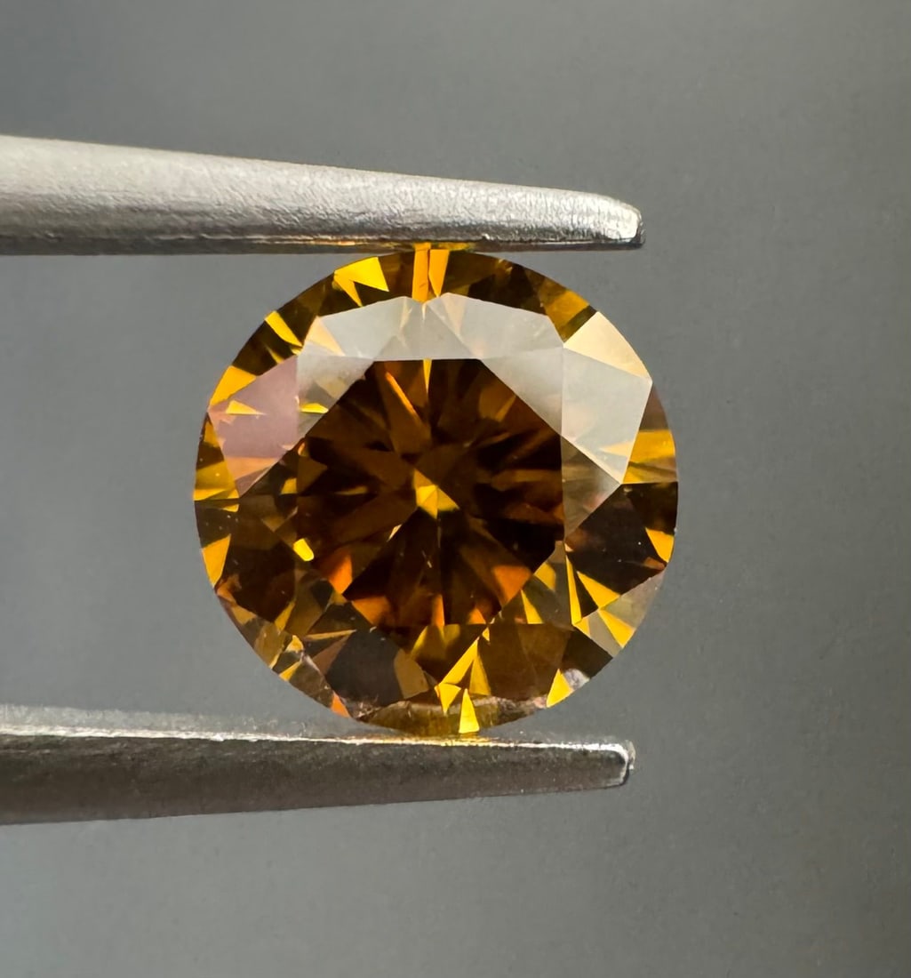 Loose Diamond - ROUND 0.51ct Fancy Deep Orange Yellow VS2: Loose Diamond - ROUND 0.51ct Fancy Deep Orange Yellow VS2 Source: Natural Shape: ROUND Carats: 0.51 Color: Fancy Deep Orange Yellow Certification: GIA The Diamond Depot Guarantee: All items in this au