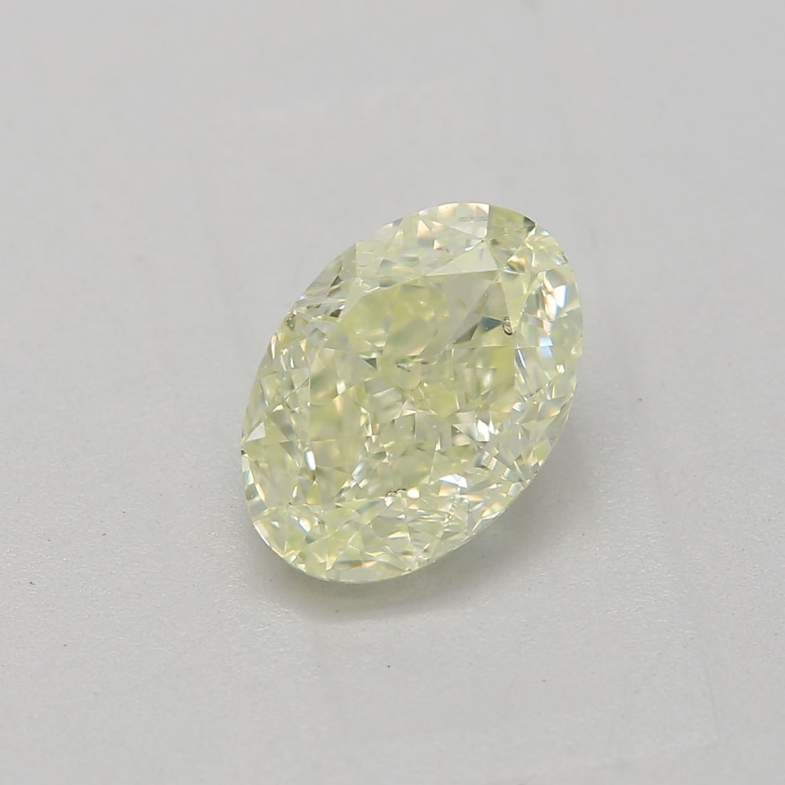 Loose Diamond - OVAL 1.0ct Fancy Light Yellow SI2: Loose Diamond - OVAL 1.0ct Fancy Light Yellow SI2 Source: Natural Shape: OVAL Carats: 1.0 Color: Fancy Light Yellow Certification: GIA Video: