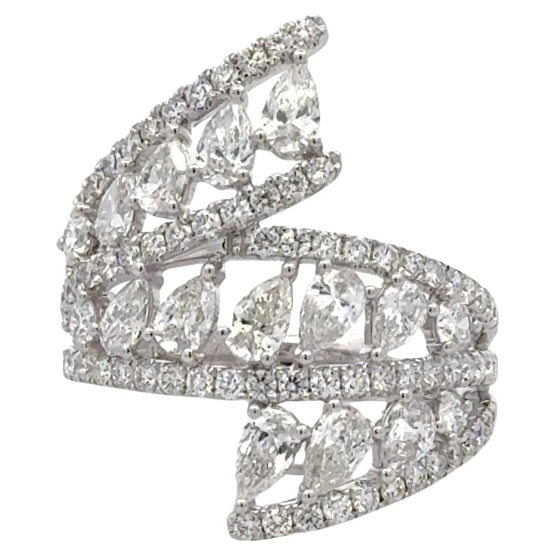 Harbor Diamonds 18K White Gold 2.44 Carat Diamond Swirl Ring: Harbor Diamonds 18K White Gold 2.44 Carat Diamond Swirl Ring This stunning contemporary ring showcases a captivating design featuring a swirl of sparkling diamonds. Crafted from premium 18k white gold