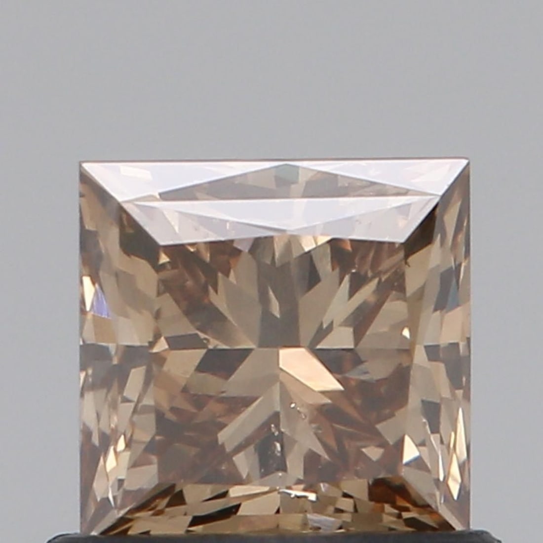 Loose Diamond - PRINCESS 0.79ct Fancy Brown SI1: Loose Diamond - PRINCESS 0.79ct Fancy Brown SI1 Source: Natural Shape: PRINCESS Carats: 0.79 Color: Fancy Brown Certification: NONE Video: