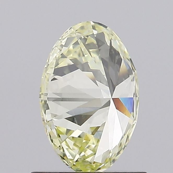 Loose Diamond - OVAL 0.81ct Fancy Light Yellow VS2: Loose Diamond - OVAL 0.81ct Fancy Light Yellow VS2 Source: Natural Shape: OVAL Carats: 0.81 Color: Fancy Light Yellow Certification: GIA Video: