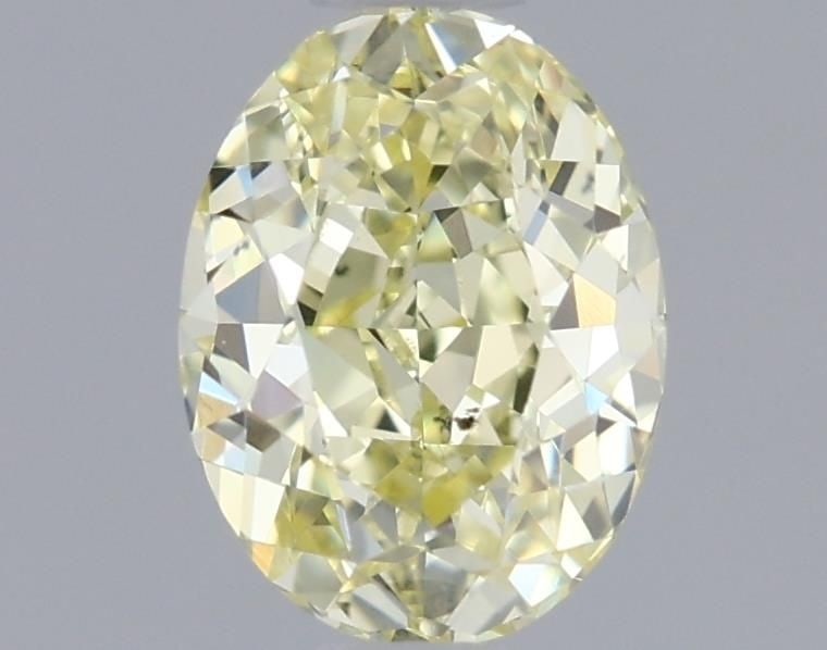 Loose Diamond - OVAL 0.71ct Fancy Light Yellow SI1: Loose Diamond - OVAL 0.71ct Fancy Light Yellow SI1 Source: Natural Shape: OVAL Carats: 0.71 Color: Fancy Light Yellow Certification: GIA Video: