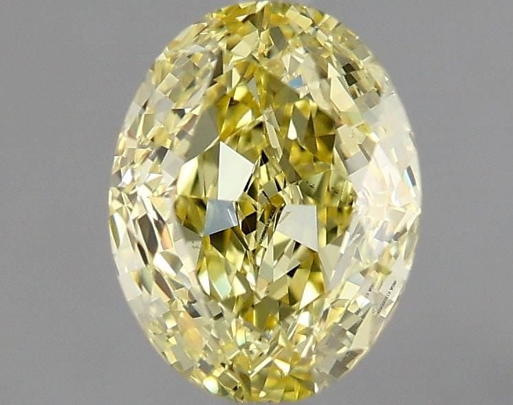 Loose Diamond - OVAL 0.9ct Fancy Intense Yellow VS2: Loose Diamond - OVAL 0.9ct Fancy Intense Yellow VS2 Source: Natural Shape: OVAL Carats: 0.9 Color: Fancy Intense Yellow Certification: GIA Video: