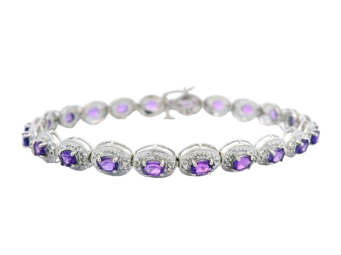 10k White Gold Amethyst Diamond Tennis Bracelet 7 Inch Oval Link: 10k White Gold Amethyst Diamond Tennis Bracelet 7 Inch Oval Link This stunning 10k White Gold Amethyst & Diamond Oval Link Line Tennis Bracelet showcases a beautiful design perfect for any occasion. F