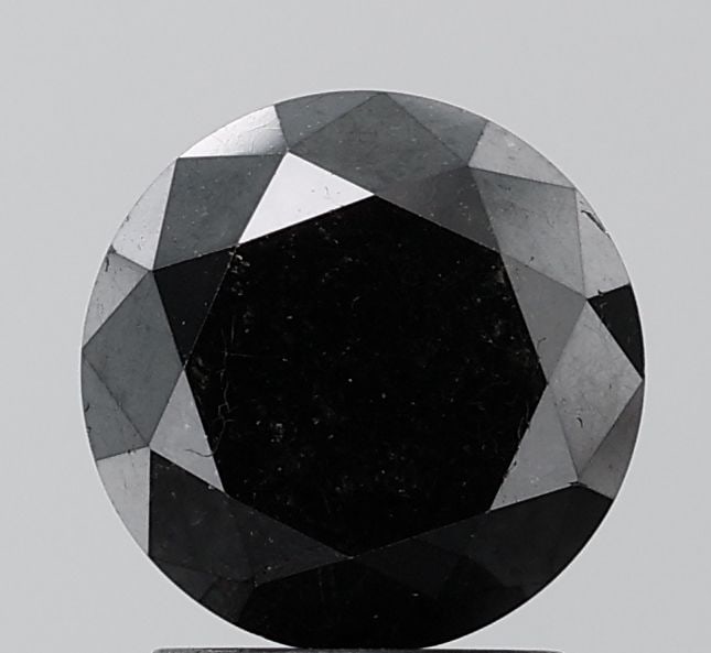 Loose Diamond - ROUND 2.69ct Fancy Black VS1: Loose Diamond - ROUND 2.69ct Fancy Black VS1 Source: Natural Shape: ROUND Carats: 2.69 Color: Fancy Black Certification: NONE Video: