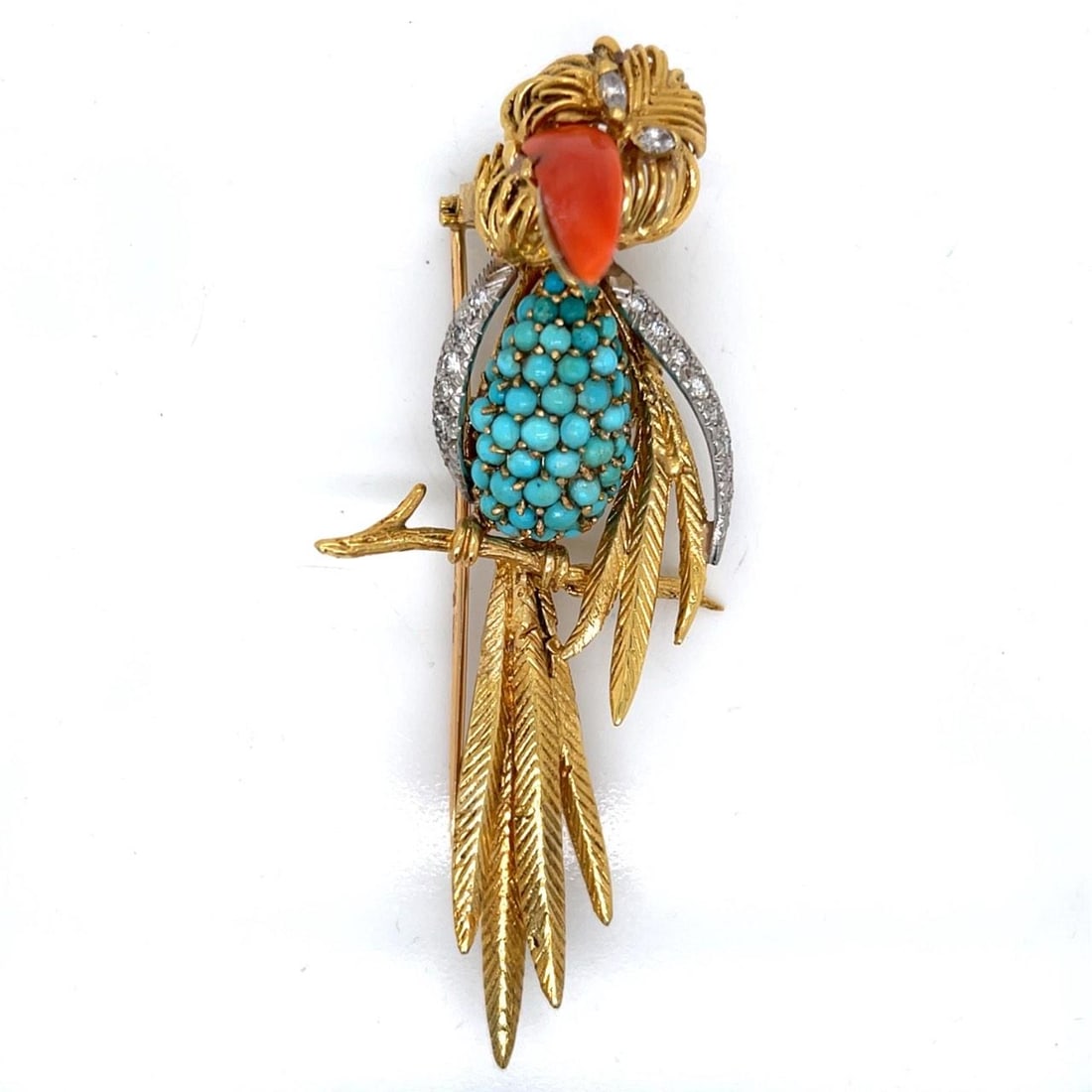 18K Gold Vintage Bird Brooch with Coral Turquoise and Diamond Accents 1960s: 18K Gold Vintage Bird Brooch with Coral Turquoise and Diamond Accents 1960s This 1960s brooch features a bird motif crafted in 18K yellow gold. It is set with coral and turquoise accents, along with 1