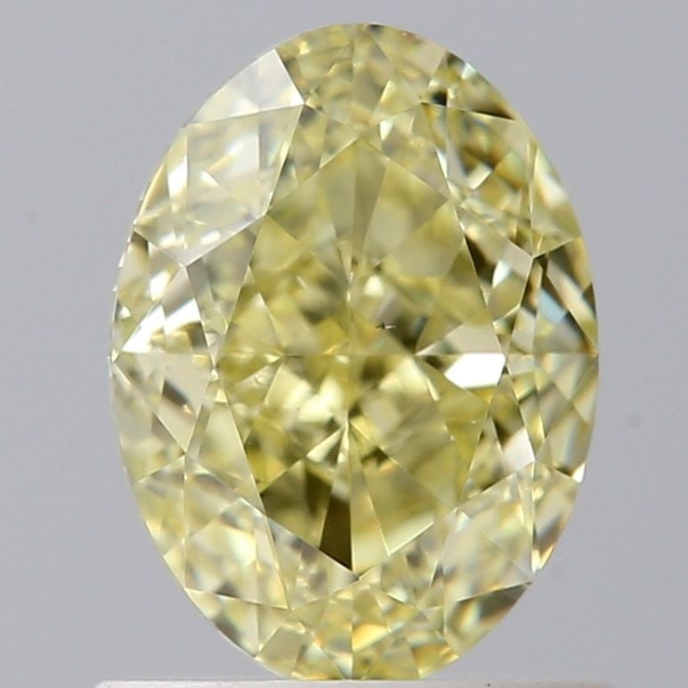 Loose Diamond - OVAL 1.07ct Fancy Yellow VS1: Loose Diamond - OVAL 1.07ct Fancy Yellow VS1 Source: Natural Shape: OVAL Carats: 1.07 Color: Fancy Yellow Certification: GIA The Diamond Depot Guarantee: All items in this auction are guaranteed to be