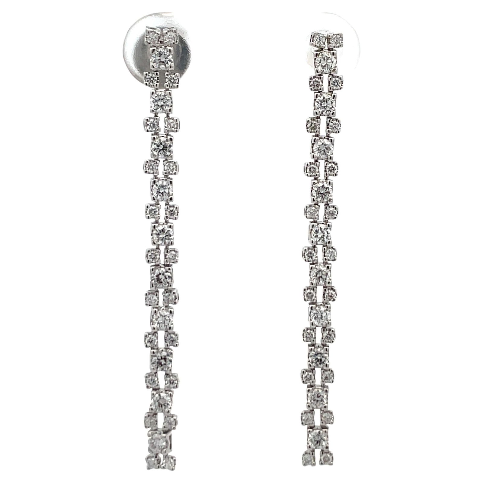 Harbor Diamonds 18K White Gold 1.05 Carat Diamond Dangle Earrings: Harbor Diamonds 18K White Gold 1.05 Carat Diamond Dangle Earrings These elegant long dangle drop earrings are crafted from luxurious 18 karat white gold, showcasing a contemporary design. Adorned with