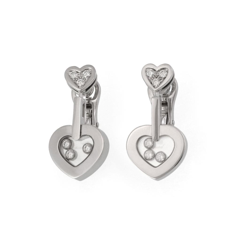 Chopard Happy Diamond 18k White Gold Heart Earrings with Diamonds: Chopard Happy Diamond 18k White Gold Heart Earrings with Diamonds Elevate your elegance with these stunning Chopard Happy Diamond Earrings, crafted from luxurious 18k white gold. This exquisite pair f