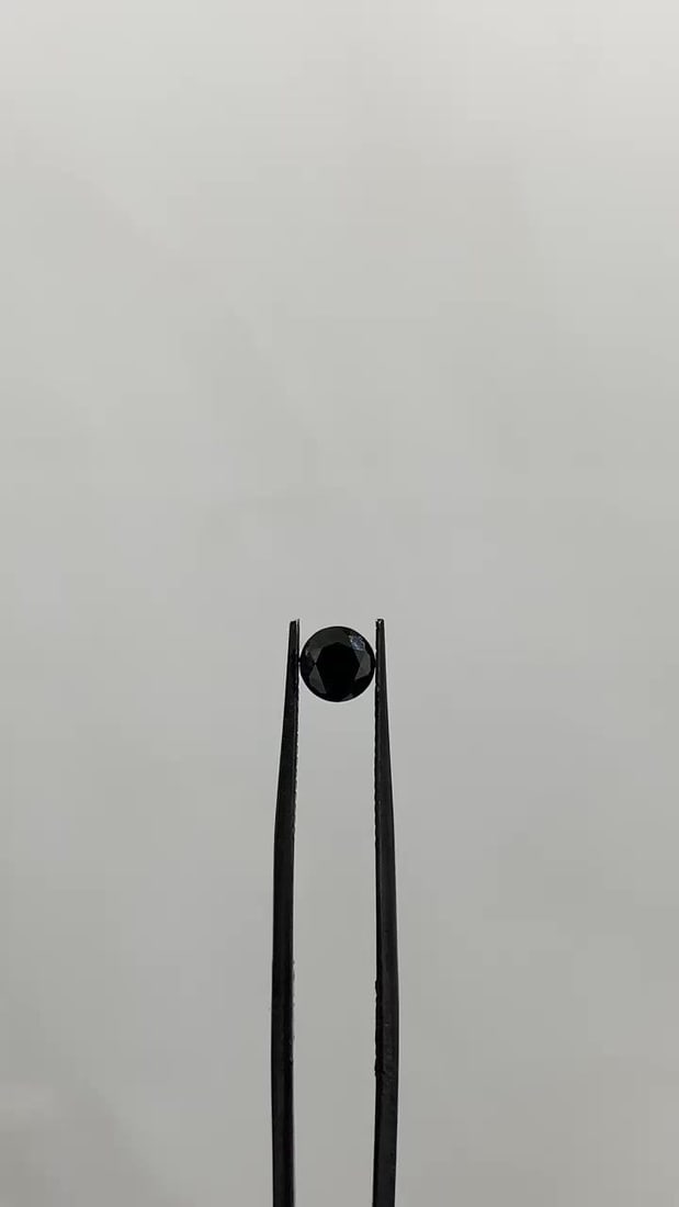 Loose Diamond - ROUND 0.77ct Fancy Black VVS2: Loose Diamond - ROUND 0.77ct Fancy Black VVS2 Source: Natural Shape: ROUND Carats: 0.77 Color: Fancy Black Certification: GIA Video: