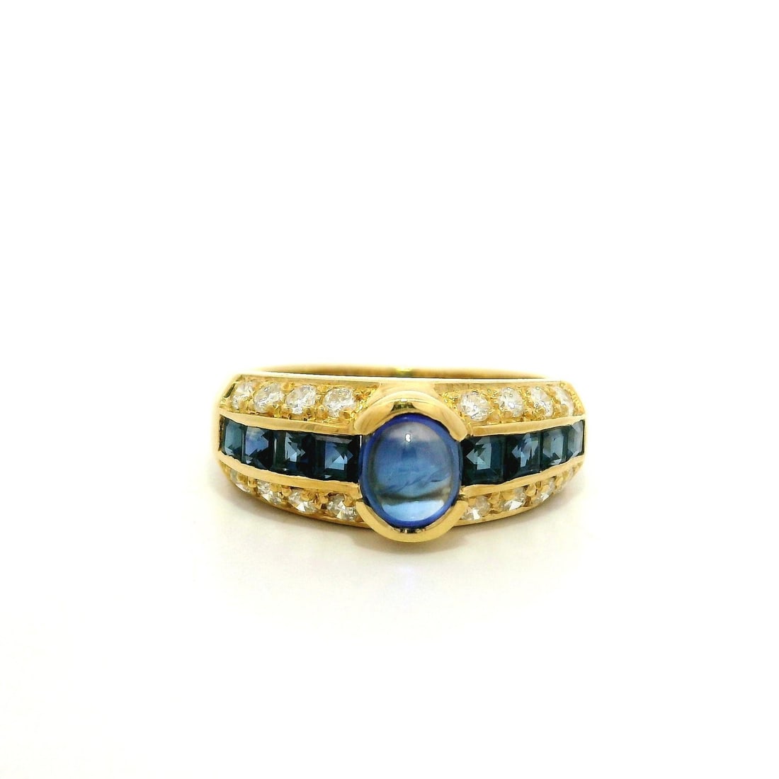 18K Yellow Gold 2.01ct Cabochon Sapphire & Diamond Band Ring: 18K Yellow Gold 2.01ct Cabochon Sapphire & Diamond Band Ring Elevate your jewelry collection with this stunning 18k Yellow Gold Band Ring featuring a high-quality cabochon sapphire and diamonds. The r