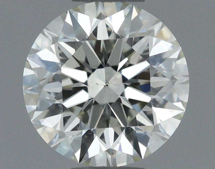 Loose Diamond - ROUND 0.7ct J VS2: Loose Diamond - ROUND 0.7ct J VS2 Source: Natural Shape: ROUND Carats: 0.7 Color: J Clarity: VS2 Certification: IGI Video: