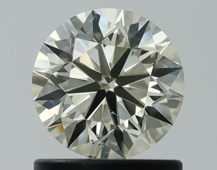 Loose Diamond - ROUND 0.93ct O-P SI1: Loose Diamond - ROUND 0.93ct O-P SI1 Source: Natural Shape: ROUND Carats: 0.93 Color: O-P Certification: GIA Video: