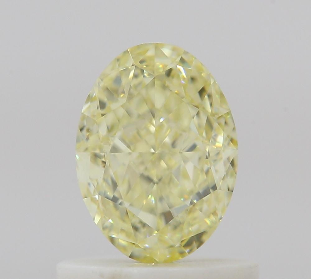 Loose Diamond - OVAL 0.87ct Fancy Light Yellow VS1: Loose Diamond - OVAL 0.87ct Fancy Light Yellow VS1 Source: Natural Shape: OVAL Carats: 0.87 Color: Fancy Light Yellow Certification: GIA Video: