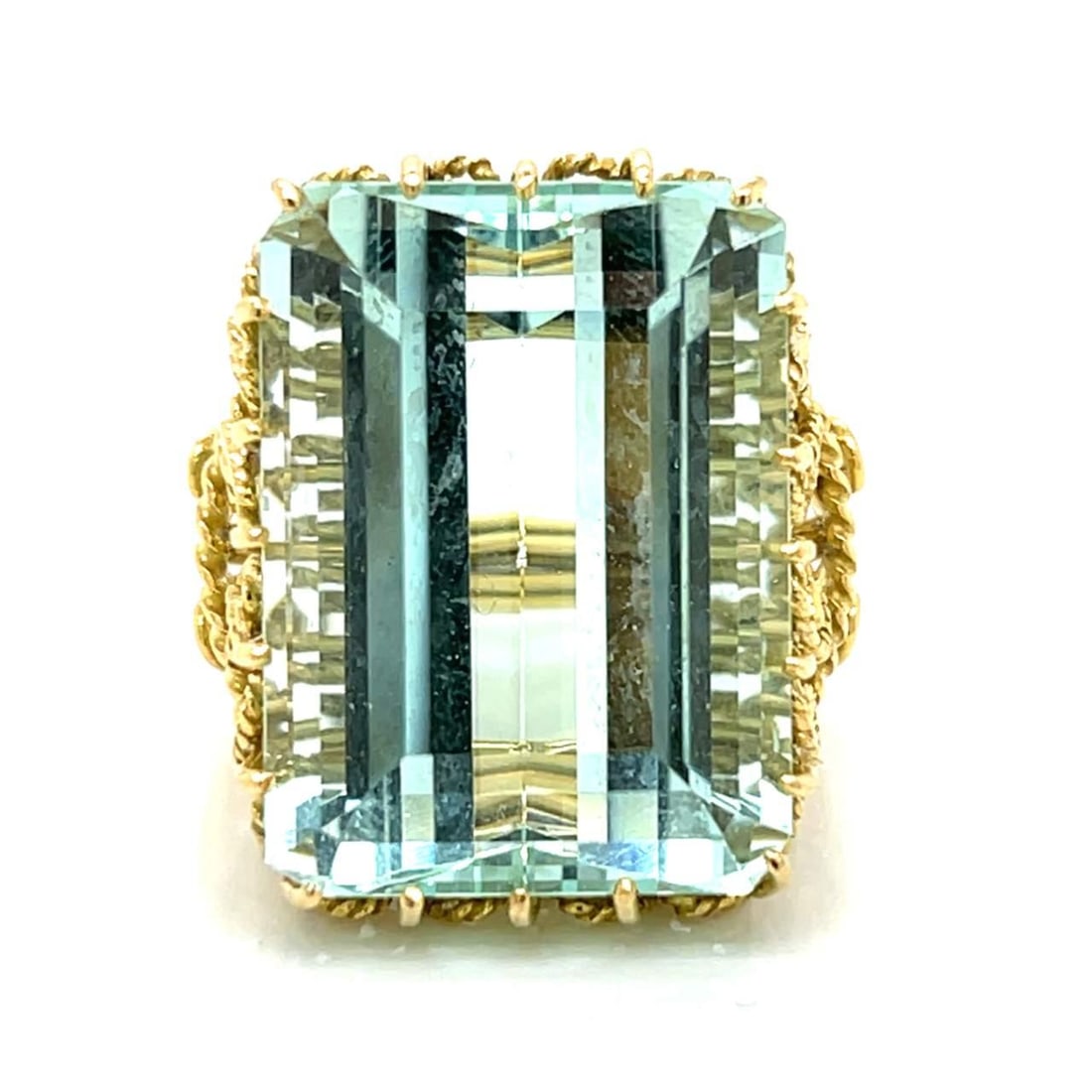 Vintage 1960's 18K Yellow Gold 45 Ct Aquamarine Ring: Vintage 1960's 18K Yellow Gold 45 Ct Aquamarine Ring This stunning 1960's ring features a luxurious 18K yellow gold setting adorned with a captivating approximately 45.00 ct aquamarine gemstone. Weigh