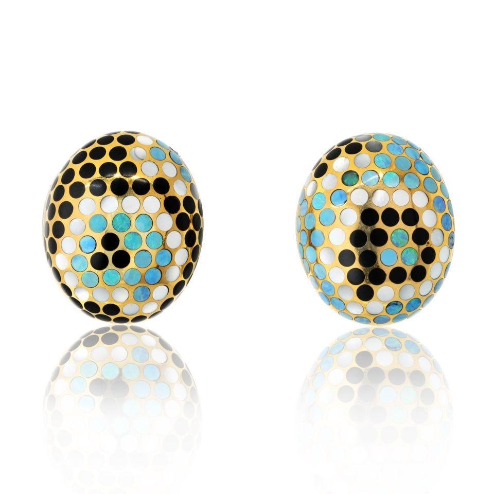 Angela Cummings 18K Yellow Gold Fire Opal Black Jade Earrings 1986: Angela Cummings 18K Yellow Gold Fire Opal Black Jade Earrings 1986 These exquisite earrings by Angela Cummings feature a stunning combination of fire opal and black jade, set in luxurious 18K yellow g