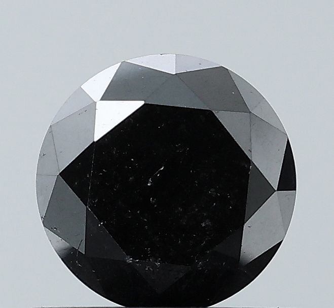Loose Diamond - ROUND 0.81ct Fancy Black VS1: Loose Diamond - ROUND 0.81ct Fancy Black VS1 Source: Natural Shape: ROUND Carats: 0.81 Color: Fancy Black Certification: NONE Video:
