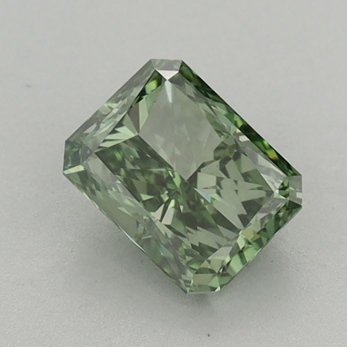Loose Diamond - RADIANT 0.91ct Fancy Vivid Green VS1: Loose Diamond - RADIANT 0.91ct Fancy Vivid Green VS1 Source: This is a real non-mined Diamond that has been grown in a lab Shape: RADIANT Carats: 0.91 Color: Fancy Vivid Green Certification: IGI Video