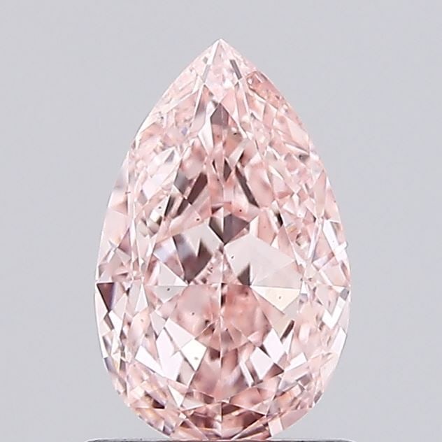 Loose Diamond - PEAR 1.03ct Fancy Vivid Pink VS2: Loose Diamond - PEAR 1.03ct Fancy Vivid Pink VS2 Source: This is a real non-mined Diamond that has been grown in a lab Shape: PEAR Carats: 1.03 Color: Fancy Vivid Pink Certification: IGI Video: