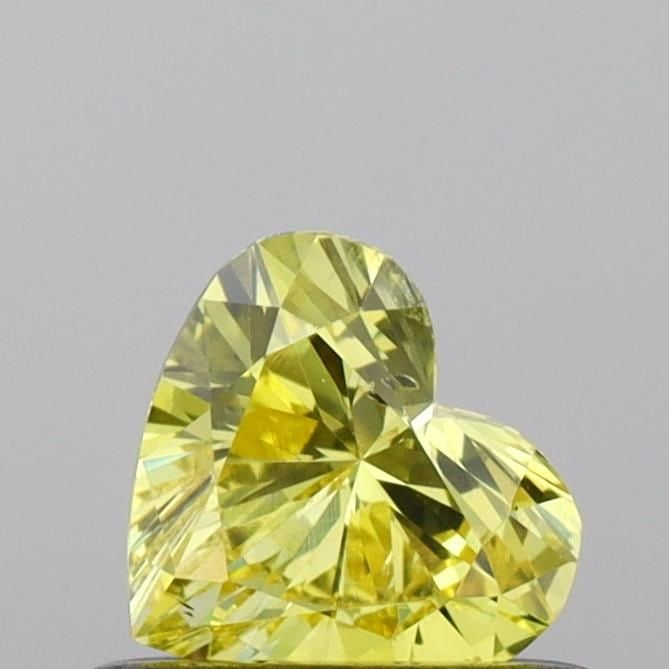 Loose Diamond - HEART 0.4ct Fancy Vivid Yellow SI1: Loose Diamond - HEART 0.4ct Fancy Vivid Yellow SI1 Source: This is a real non-mined Diamond that has been grown in a lab Shape: HEART Carats: 0.4 Color: Fancy Vivid Yellow Certification: IGI Video: