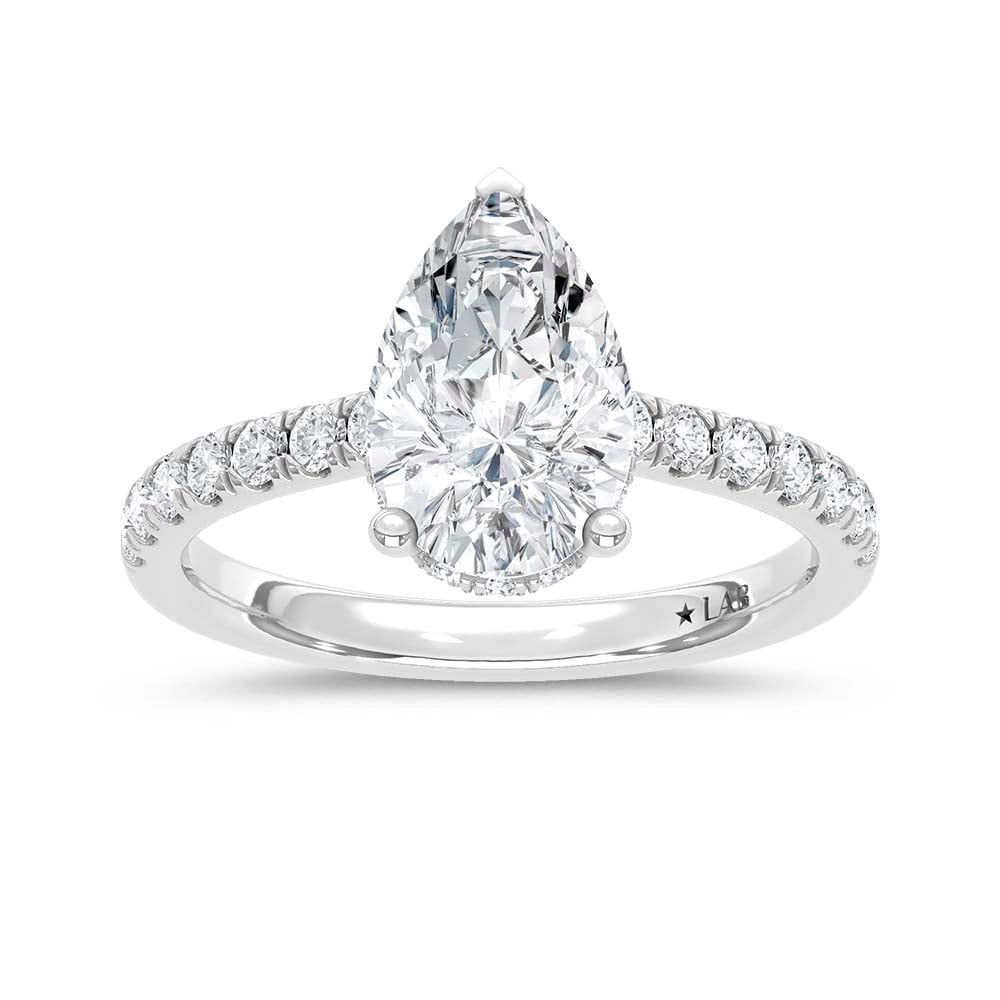 14K White Gold Lab Grown Diamond 4 1/2 Ct.Tw. Pear Hidden Halo Engagement Ring (IGI Certified: 14K White Gold Lab Grown Diamond 4 1/2 Ct.Tw. Pear Hidden Halo Engagement Ring (IGI Certified Center 4ct) Discover subtle brilliance and modern elegance with our Hidden Halo Diamond Engagement Ring. T