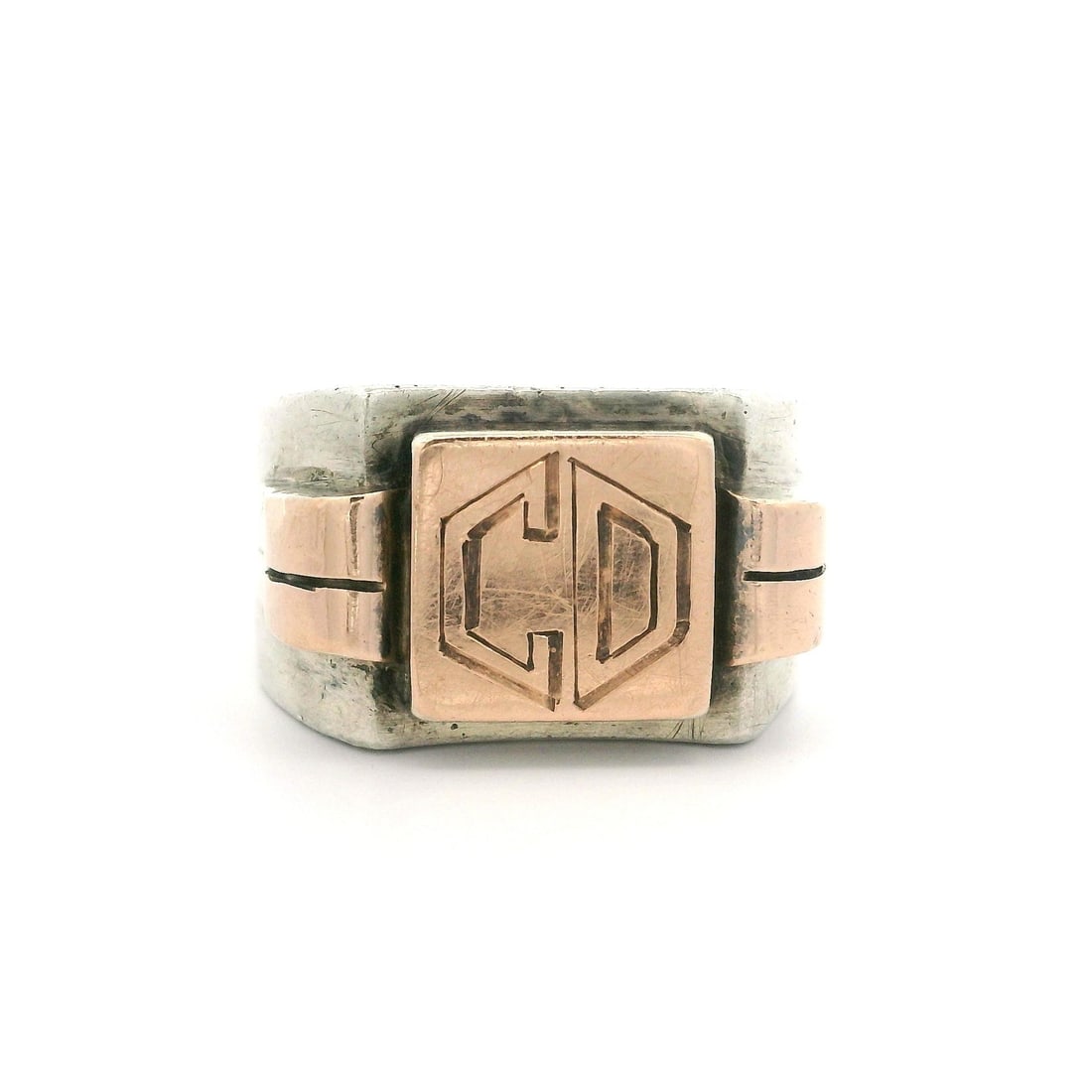Antique 18K Rose Gold Sterling Silver Monogrammed CD Signet Ring: Antique 18K Rose Gold Sterling Silver Monogrammed CD Signet Ring This exquisite antique signet band ring is crafted from 18k rose gold and sterling silver (.925), featuring a unique "CD" monogram engr
