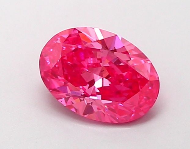 Loose Diamond - OVAL 1.05ct Fancy Vivid Pink VS2: Loose Diamond - OVAL 1.05ct Fancy Vivid Pink VS2 Source: This is a real non-mined Diamond that has been grown in a lab Shape: OVAL Carats: 1.05 Color: Fancy Vivid Pink Certification: IGI Video: