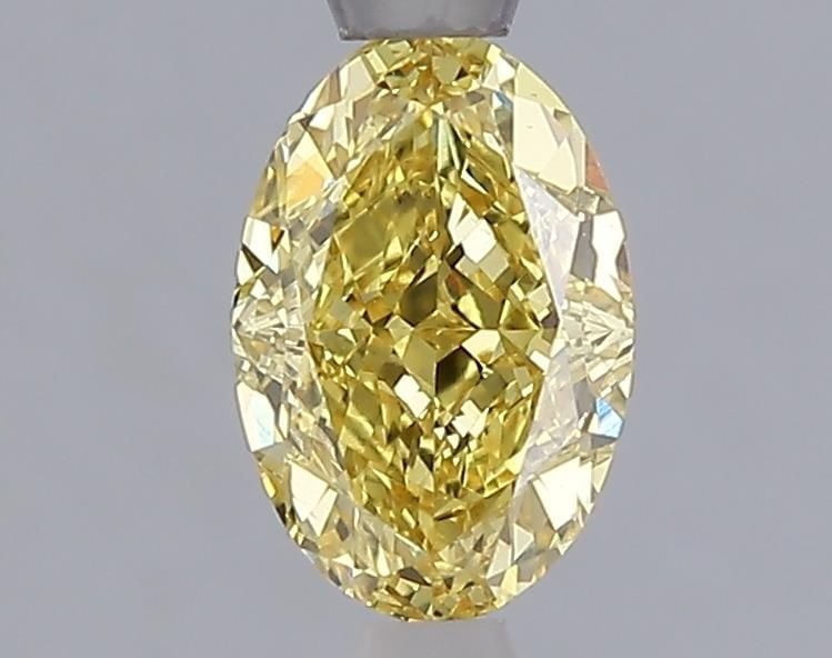 Loose Diamond - OVAL 1.06ct Fancy Vivid Yellow VVS2: Loose Diamond - OVAL 1.06ct Fancy Vivid Yellow VVS2 Source: This is a real non-mined Diamond that has been grown in a lab Shape: OVAL Carats: 1.06 Color: Fancy Vivid Yellow Certification: IGI Video: