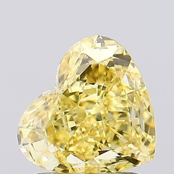 Loose Diamond - HEART 1.65ct Fancy Intense Yellow SI1: Loose Diamond - HEART 1.65ct Fancy Intense Yellow SI1 Source: This is a real non-mined Diamond that has been grown in a lab Shape: HEART Carats: 1.65 Color: Fancy Intense Yellow Certification: IGI Vid