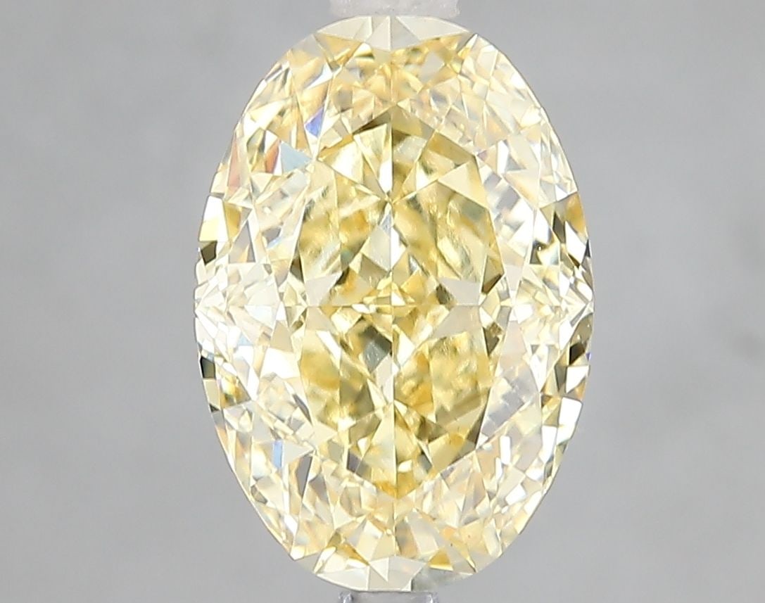 Loose Diamond - OVAL 4.11ct Fancy Vivid Yellow VS1: Loose Diamond - OVAL 4.11ct Fancy Vivid Yellow VS1 Source: This is a real non-mined Diamond that has been grown in a lab Shape: OVAL Carats: 4.11 Color: Fancy Vivid Yellow Certification: IGI Video: