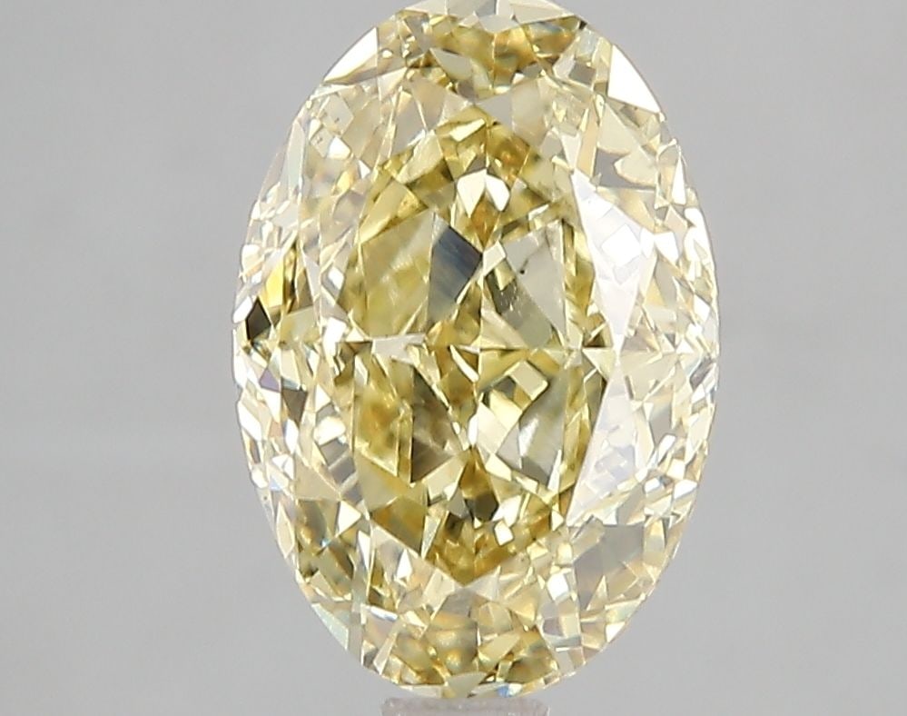 Loose Diamond - OVAL 3.02ct Fancy Intense Yellow VS2: Loose Diamond - OVAL 3.02ct Fancy Intense Yellow VS2 Source: This is a real non-mined Diamond that has been grown in a lab Shape: OVAL Carats: 3.02 Color: Fancy Intense Yellow Certification: IGI Video