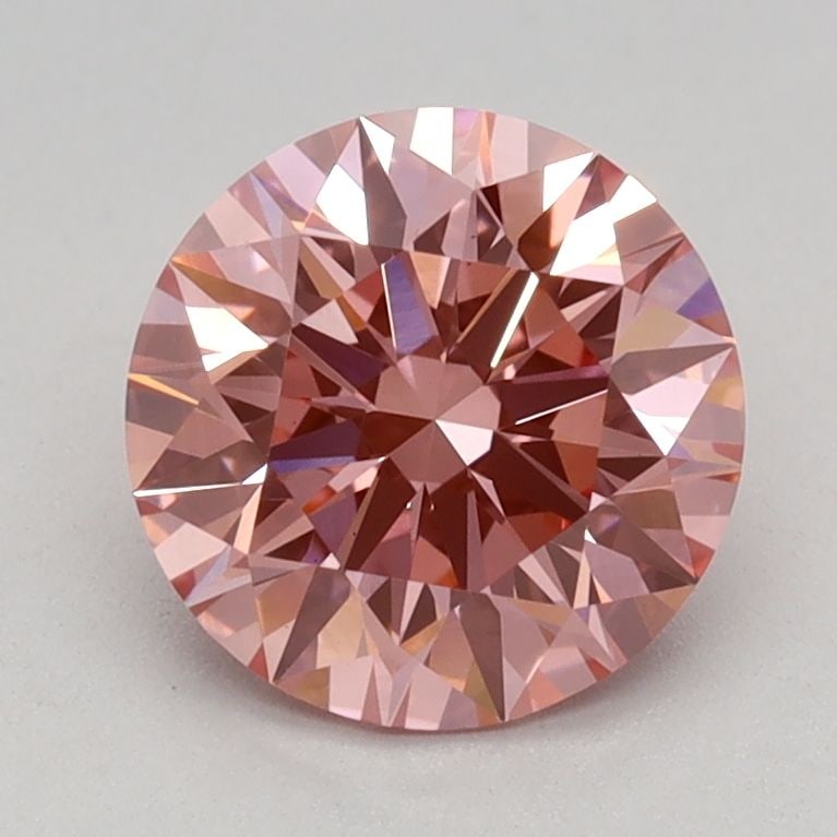 Ideal Loose Diamond - ROUND 1.12ct Fancy Vivid Pink VS1: Ideal Loose Diamond - ROUND 1.12ct Fancy Vivid Pink VS1 Source: This is a real non-mined Diamond that has been grown in a lab Shape: ROUND Carats: 1.12 Color: Fancy Vivid Pink Certification: IGI Video